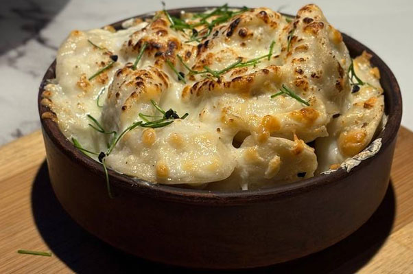 Фото Пельмени  из курицы запечённые с сыром 